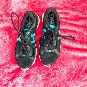 Black and light blue under armour sneakers